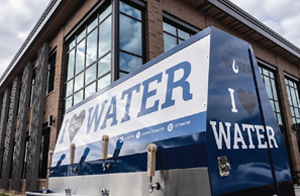 Large water dispenser with Charlotte Water logo
