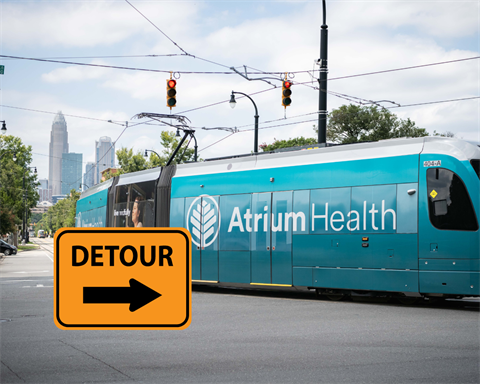 CATS gold line on the tracks and a detour sign