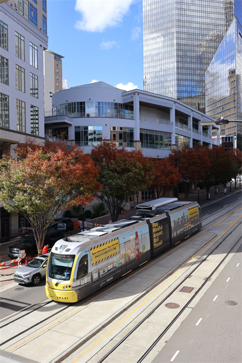 CATS Gold Line smart rail traveling through down town