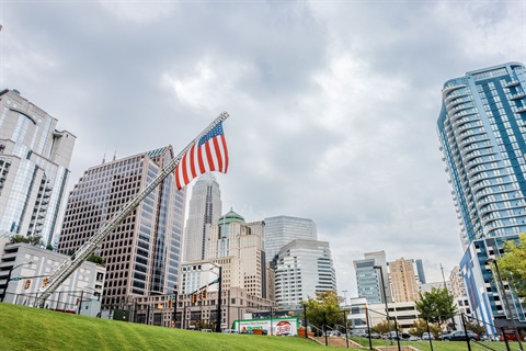 USA Flag and Charlotte Skyline