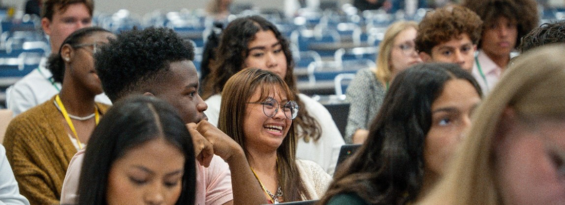 Students smiling at camera at Job and Career Readiness Training session.