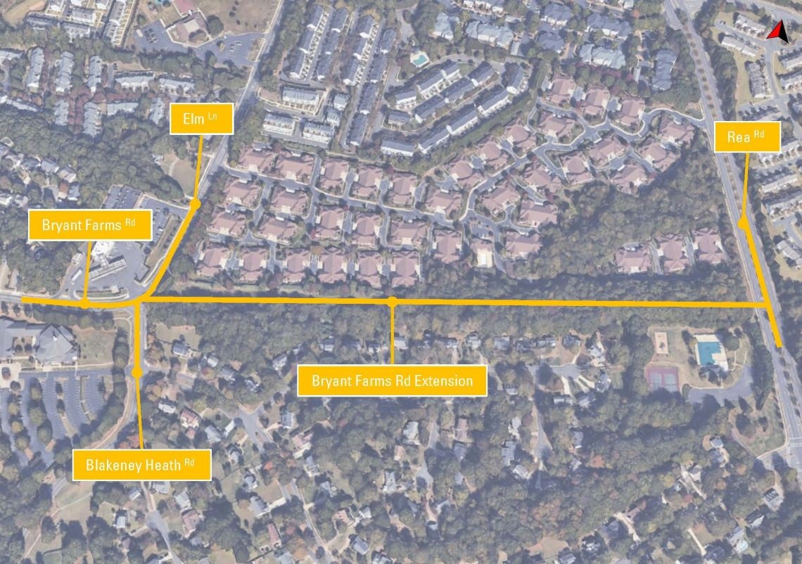 an aerial map of the project area with yellow lines depicting where the new roadway will go, travel east-west between Elm Lane and Rea Road
