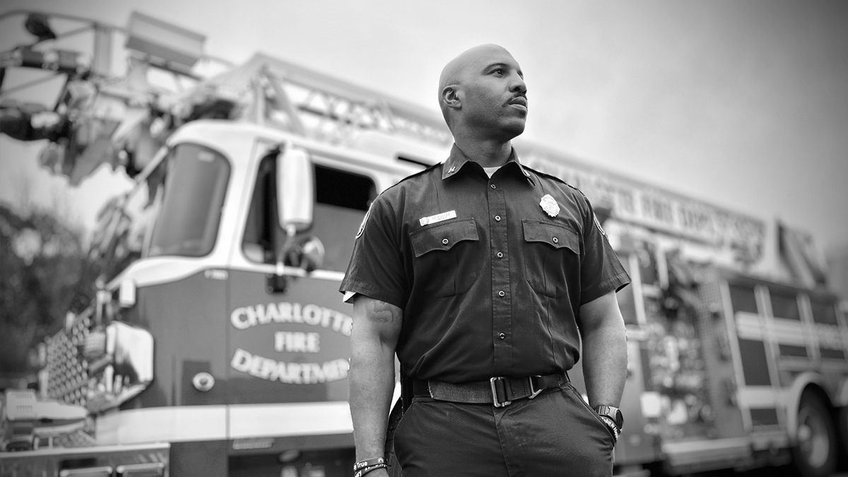 With determination in his gaze, Captain Fuller reflects on the challenges and triumphs of his firefighting career. His leadership within Charlotte Fire extends far beyond emergencies, making a lasting impact on his team and the community. 