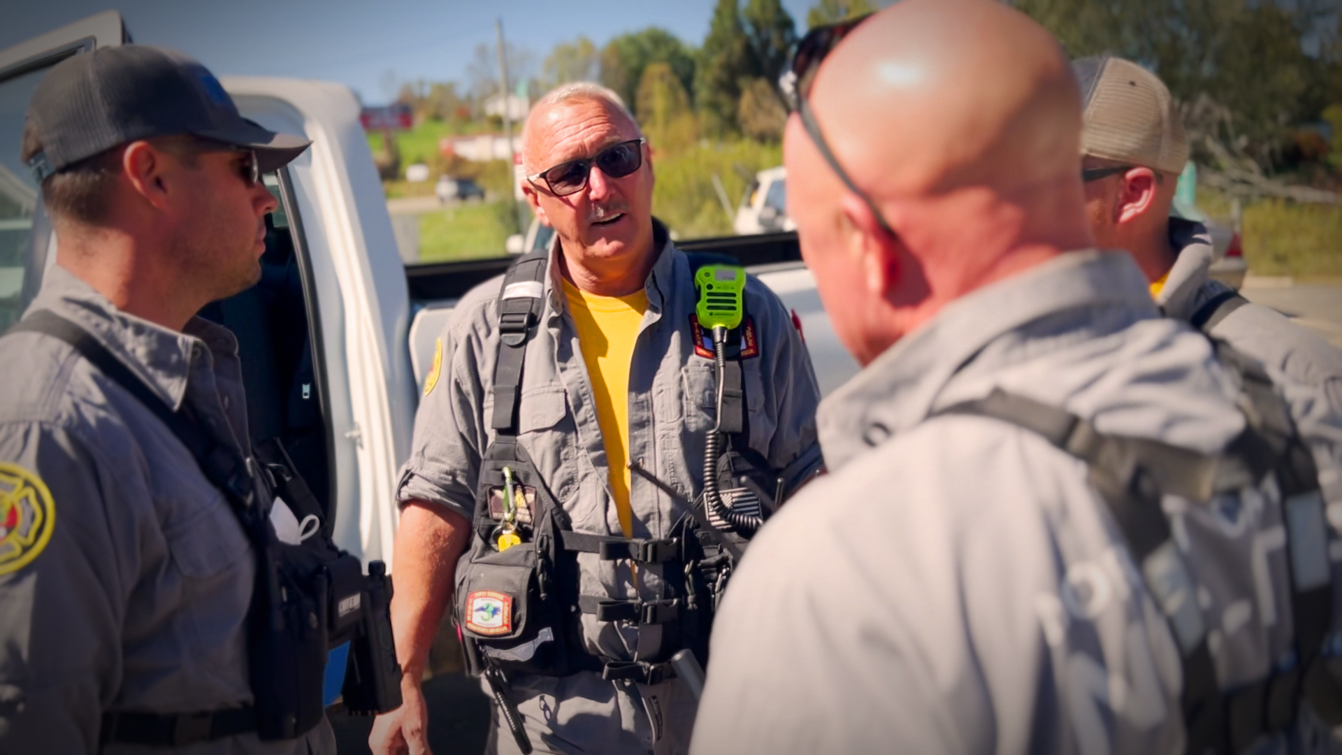 Captain Jerry Rodgers leads his Charlotte Fire crew, briefing them on their ongoing mission to assist Yancey County residents in the aftermath of Hurricane Helene. His leadership is key to keeping the team focused and mission-ready.