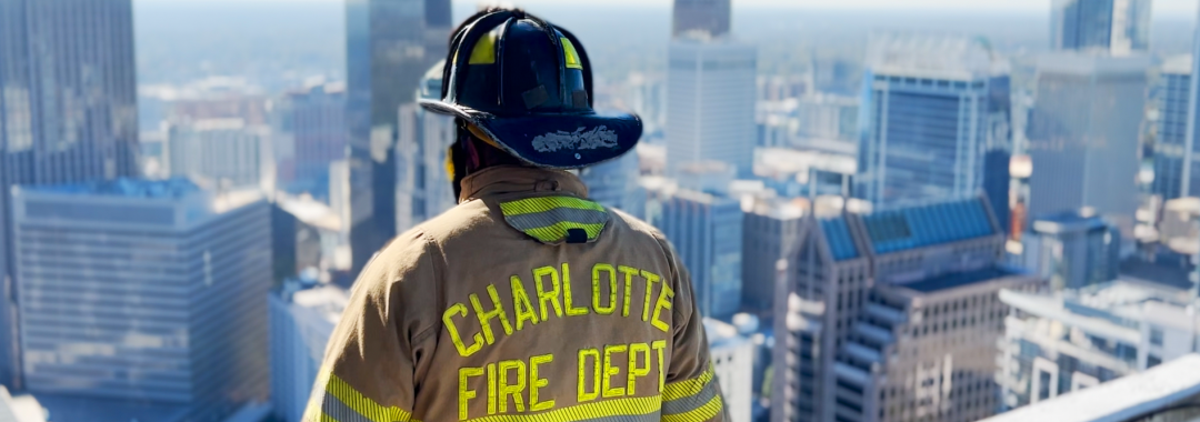 Firefighter overlooking the city