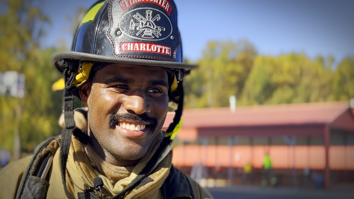 Recruit Eli Basnight, following in his father's footsteps, feels a deep connection to his hometown as he trains to protect Charlotte. 