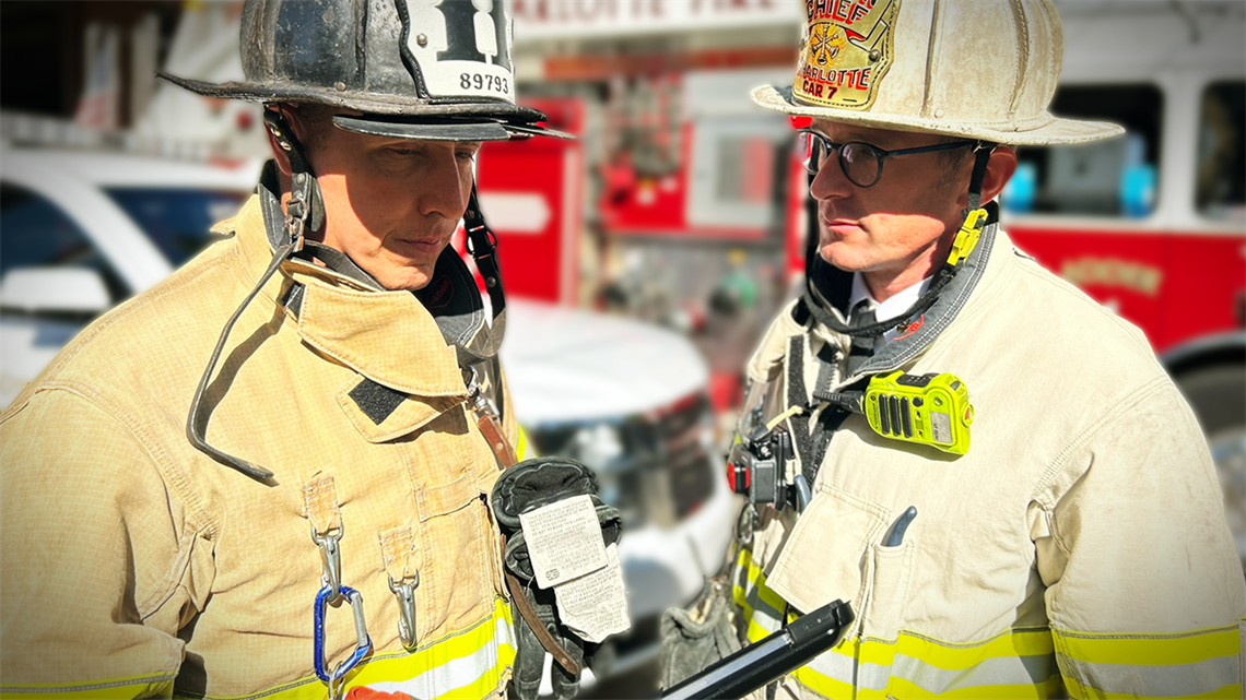 Field Technician Captain Drew Lazarus (left) discusses tactical planning with Division Chief Dave Farnum. The Field Technician program enhances operational support, allowing command staff to make more informed and strategic decisions during critical moments. 