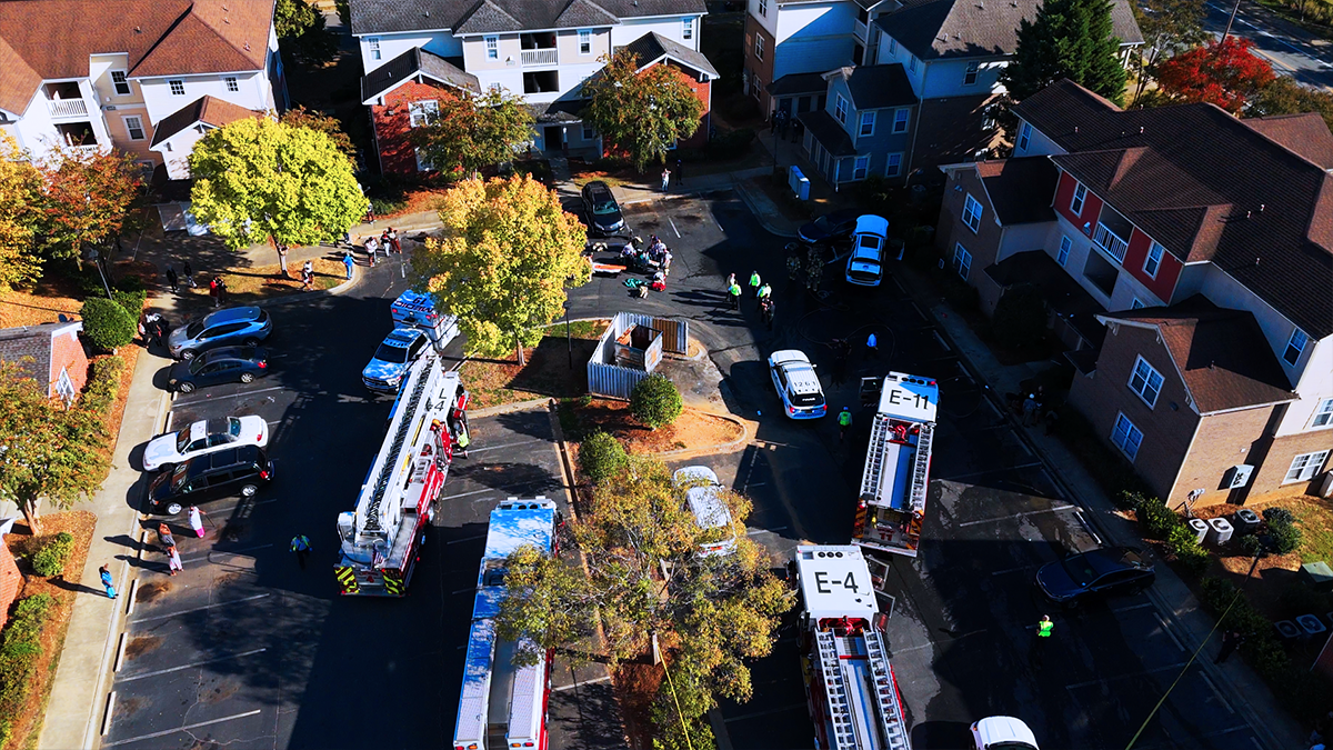 Emergency personnel gather at the Oaklawn Ave vehicle fire incident, where Field Technicians played a critical role in resource management. The support provided by Field Technicians is crucial during high-risk operations. 