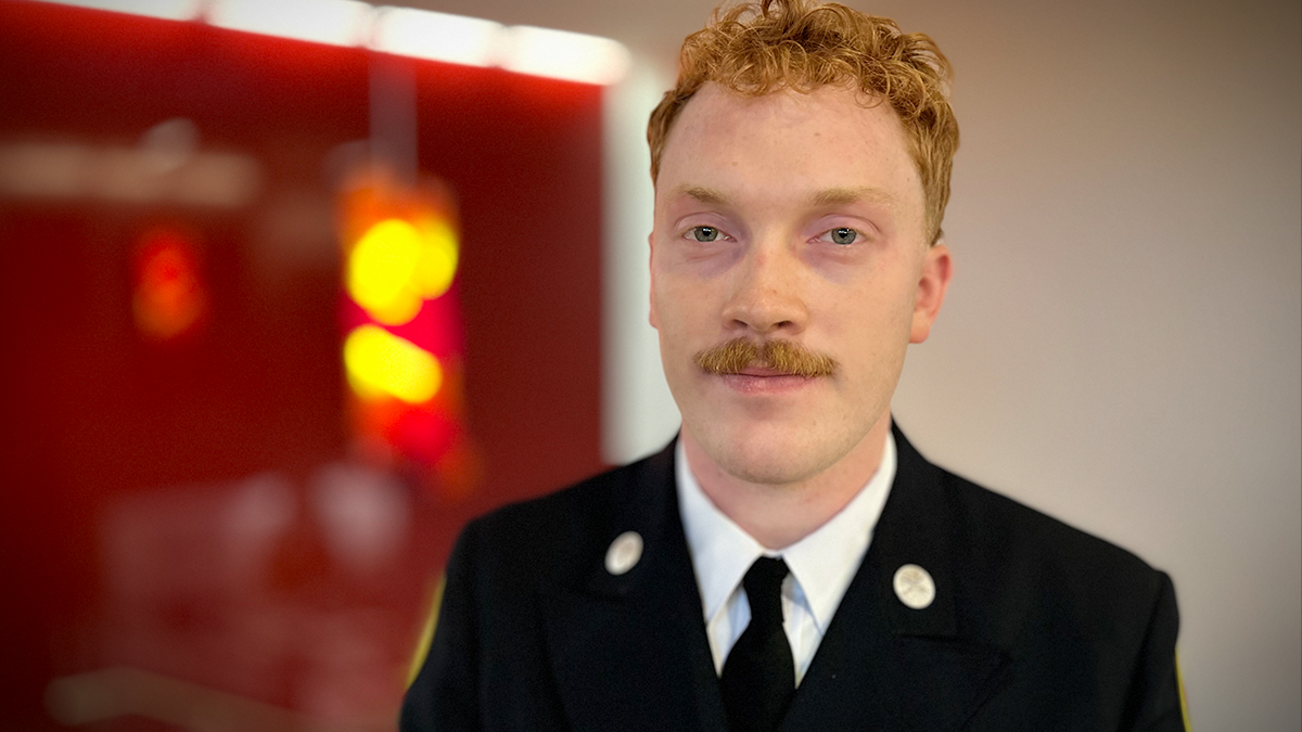 Gabriel Howard’s formal uniform underscores the significance of his badge pinning ceremony at Charlotte Fire Headquarters. This moment marks the culmination of months of hard work and his unwavering dedication to public service. 