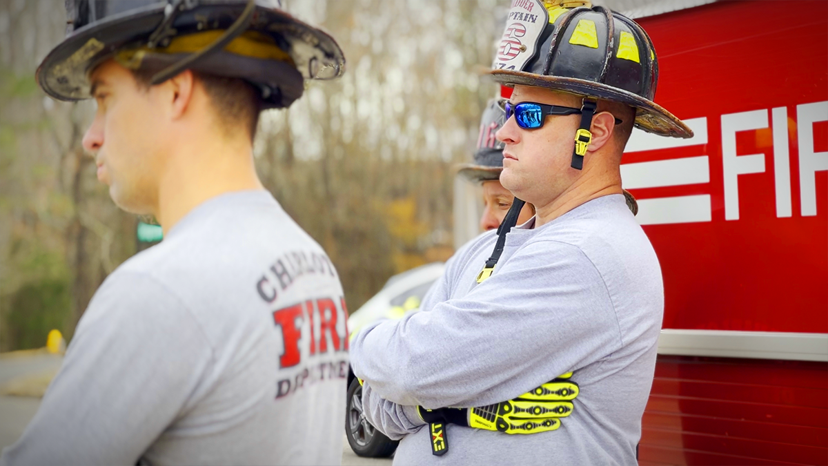 Captain Brian Benson of Ladder 16 leads his team through vehicle extrication exercises, emphasizing safety and efficiency.