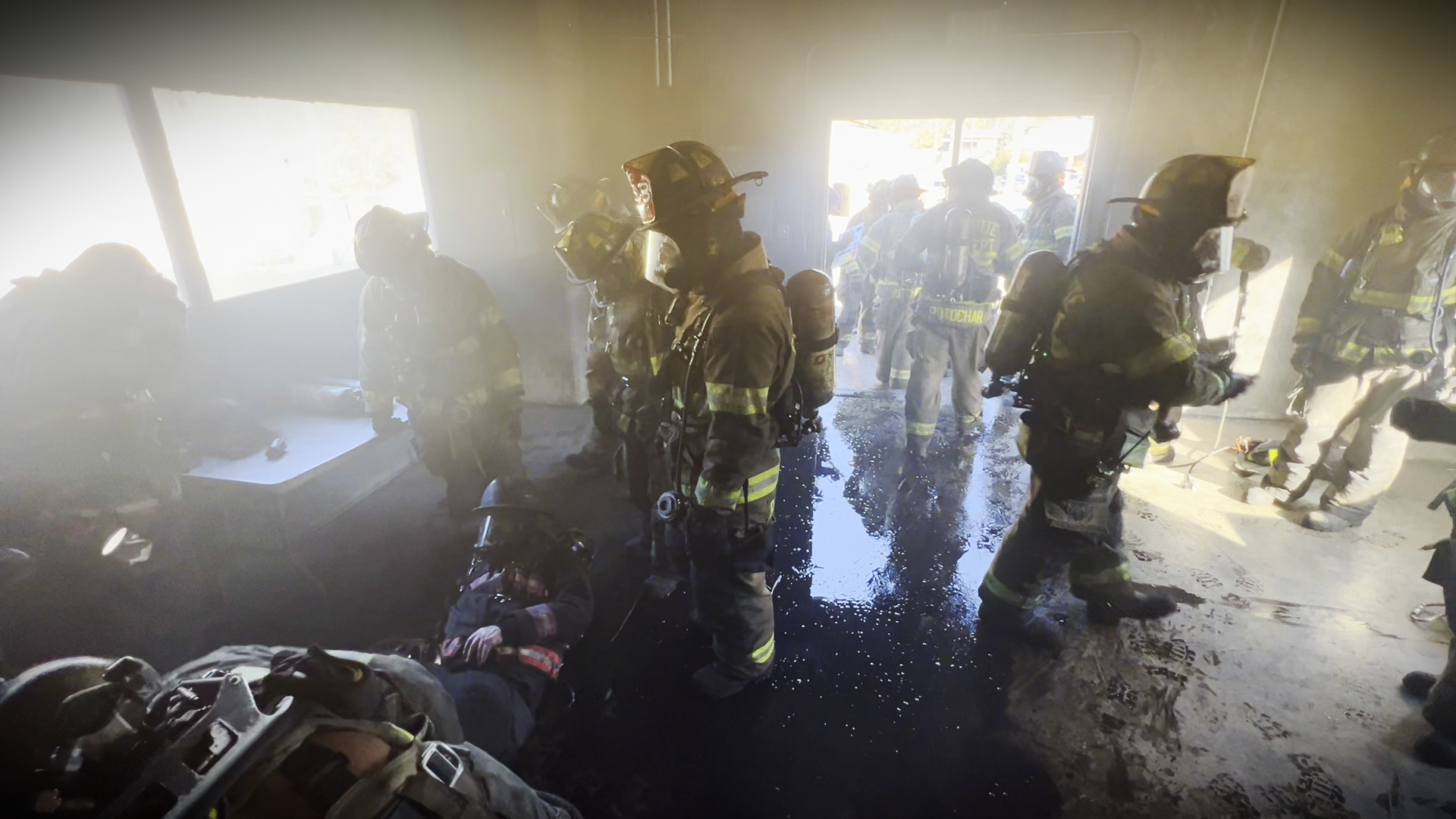 Firefighter recruits navigate a simulated Mayday scenario during Charlotte Fire's Firefighter Survival Week, honing their skills to save themselves and others.