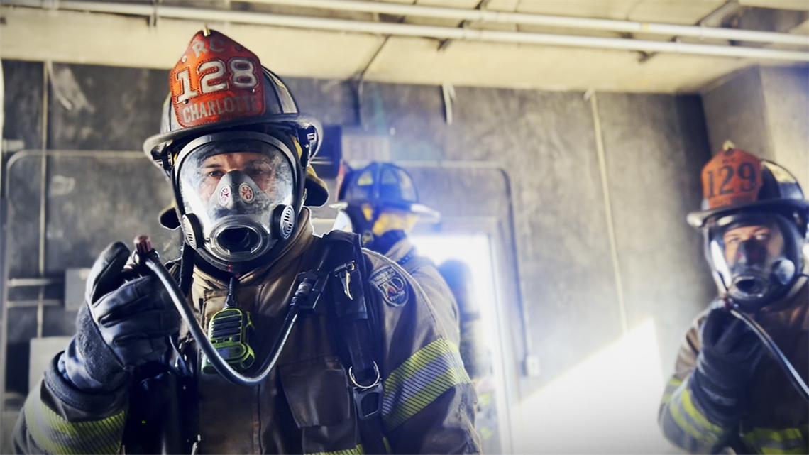 Charlotte Fire recruits simulate life-saving radio calls, understanding that quick, clear communication can mean the difference between life and death. 