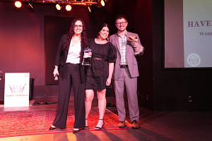 Jeni Bukolt and team from HAVEN Creative holding award