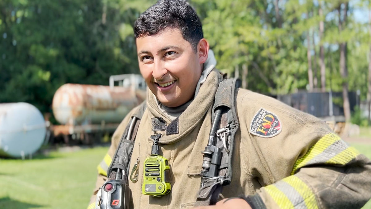 Samayoa-LaForgia smiles, once again, while training with Recruit Class 127.