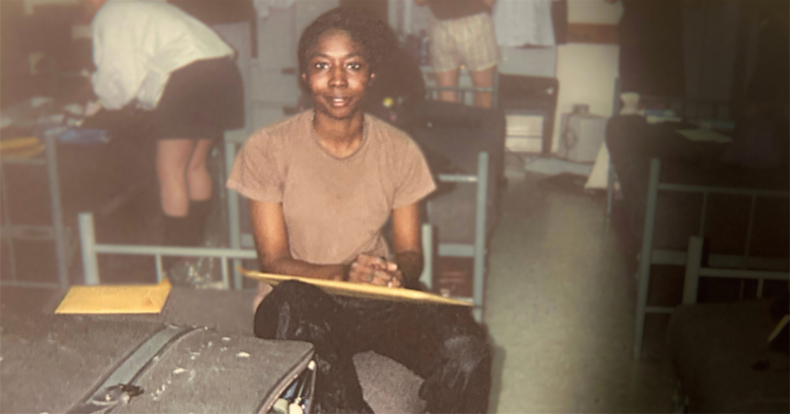 Tijuana Fox smiles at the camera while serving in the Air Force.