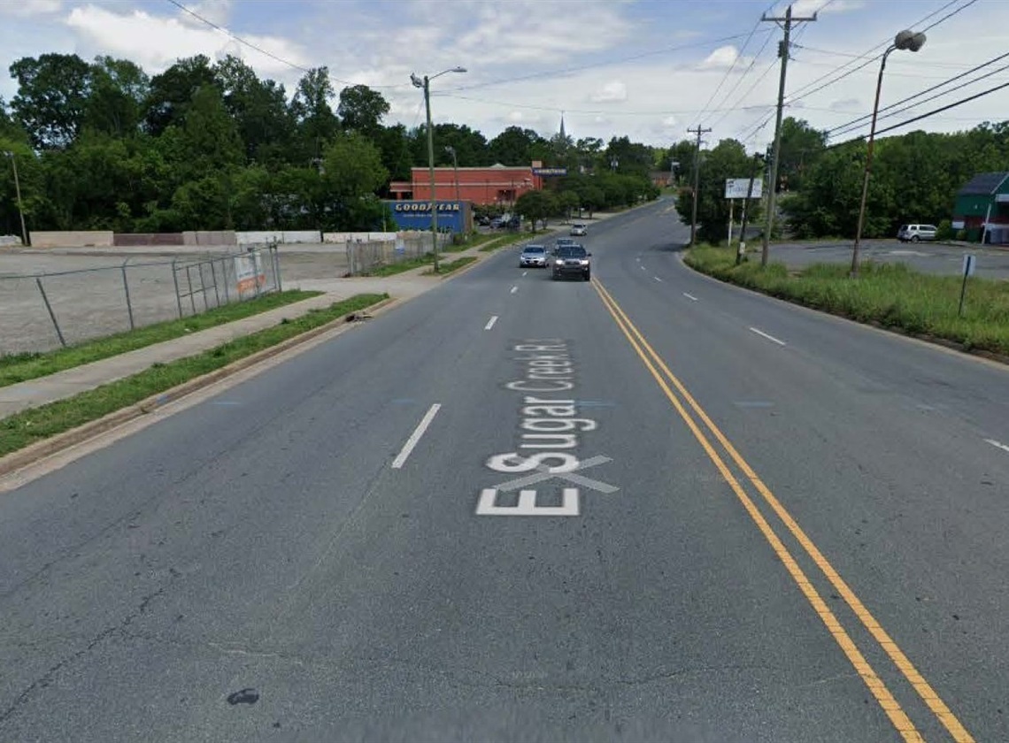 A street view image of East Sugar Creek Road before improvements